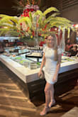 I wore this dress for my bachelorette party. I received tons of compliments on it, and it's definitely a beautiful dress! However, it was very stiff; there was no give to it so it's difficult to get in and out of the car, walk up the stairs, etc. If you have broad shoulders like I do, you will barely be able to lift your arms because the cap sleeves are so tight. It was perfect for the occasion though, and I'm still glad I bought this dress! - Rachel G.