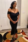 This dress was perfect for an evening out. The material is thick but not in a bad way, so it's great for a fall evening. The cleavage area stayed put. I was able to enjoy the night without the annoyance of pulling it up 50 million times! It hugged my figure well. I'm top-heavy with a smaller figure, so a good fit can be a challenge sometimes, but this dress did not disappoint! - Cassandra L.
