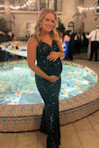 I really love this dress. I wore it to a black tie wedding, and it was perfect. It has a nice comfortable lining that eliminates any itch. The material is slightly stretchy. I am usually a size S/M but am currently 27 weeks pregnant, so I went with a large to be safe. Plenty of room!!! Bump friendly for sure if you size up. - Hannah D.