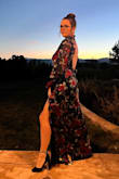 This dress is perfect. So flattering, with lightweight fabric that's super soft. I got so many compliments at the wedding I attended. The open back and slit make it sexy but not over the top. - Cynthia G.
