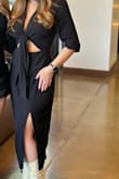 Perfect dress! A cute cutout while keeping it classy in length. I wore this for a birthday/wine-tasting day with friends. I got a lot of compliments and it was very comfortable! Slimming but not form-fitting so I didn't have to worry about the belly! - Giovanna W.