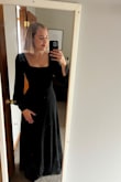 I absolutely adore the neckline on this dress. I first ordered a small based on the size guidelines but was way too big, so I got an XS which is perfect. I am 5 foot 7, and the dress hits the floor perfectly without heels on. - Megan T.