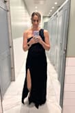 I wore this dress to a work gala and got SO many compliments! It was comfortable and fit perfectly. Although, I did wear spanx underneath. The material is a little bit stretchy and falls nicely. - Bethany R.