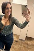 When I first took this bodysuit out of the package I thought it was going to be too small ( I bought TTS) but it actually fit like a glove! I wore pastie petals since the back is so low and I had plenty of support all night. Highly recommend this bodysuit! I wish Lulus made it in more prints and colors. - Stacey N.