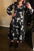 This dress just didn't fit right at all. The arms/chest area was pretty loose, but the waist was weirdly tight and the buttons were not in a straight line. Did not look good on a shorter frame. - Steph W.