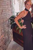 I loved this dress! It was super classy but the unique neckline and back elevated the style even more! I ordered an x-small because I needed the top to fit tight because I couldn't wear a bra, the hips were a little snug, but overall a comfortable fit. The material was great, and I highly recommended this dress. - Casey M.