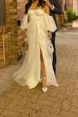 I purchased this dress for my engagement shoot and loved it. I originally ordered a size small. I typically wear a size 4-6 but it fit too small so I ended up swapping it for medium and it fit perfectly. - Jessica M.
