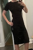 This dress fit me exactly as expected. My only wish was that there was a bit more support or coverage in the chest area, as it would be difficult to wear a bra with this one. I really like the cut-out back, however. - Samantha C.