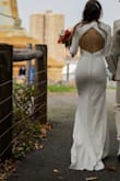 The dress is perfect. It fits the body very well but it is a little transparent so you need beige underwear. I loved the dress. It made me feel like a princess. - Karen S.