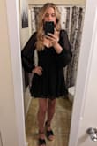 This dress is flattering and flows nicely. Bought it in green also. It's so cute it's worth it regardless, but it's not perfect: I use clothes tape to keep the top of the sleeves on my shoulders where I want them, otherwise, they sometimes slide down my arm. The ties in the back can be delicate; one broke off the dress during the first use but it was easy to sew back on. - Laura M.
