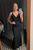 This dress is stunning. It fit perfectly, I don't have a large chest and wore tape to make sure there was no gapping. - Megan C.