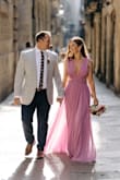 Purchased this beauty for my elopement in Spain and it was an absolute stunner! I was worried about not doing a white dress but as this was my second wedding and the color was so incredibly striking, why the heck not?!  I felt beautiful, the 'girls' looked amazing and it flowed beautifully in pictures. It does run long (even with 3-inch heels) so I wish I had it hemmed a bit but it was a last-minute selection! - Erika T.