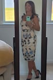 This dress is everything. It's well made. I did need to size up to a large but the fit is gorgeous. It's fully lined and the detail is perfect! The length is just right. A very flattering dress and very comfortable so I can dance the night away! - Corinne M.