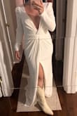 I have been searching for a long-sleeved dress and this one was perfect! It is of great quality for the price point. I do agree it runs a tad large so ordered it down a size and fit great. It is pretty low cut and the slit does go up pretty high up the leg so I might alter it to make it a little more conservative and will need to be shortened because I'm only 5'1", but overall loved everything else! - Rachel B.