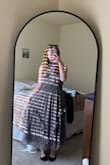 Could definitely wear it to work! It's modest while still being cute and comfortable!! The neckline was not suffocating, which I appreciated, and the buttons on the back were easy to work with! The dress was longer than I had hoped, but nothing heels can't fix! - Katelyn T.