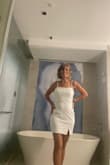 Wore to a company party in Cancun! Dress code said white or blue! Didn't even get married in a white dress! Loads of compliments! Fancy fabric, lined, and just short enough to be sexy. On sale on time! Perfection! LuLus comes through! - Sue B.