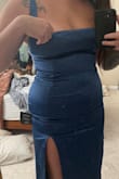 I got this to wear to my anniversary dinner. There were loose threads hanging in multiple areas (including the slit). Also, if you have wide hips and thicker thighs, this dress might not be it. The top-down to the waist fit perfectly, but the hips and thighs were tight with ZERO give and almost seemed to become more narrow. The straps are adjustable which is nice. But even sizing up for the hips would then not fit as snugly in the bust. So beautiful, the color is gorgeous, and the neckline is gorgeous. I'm sad this just won't work. - Katie H.