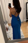 Gorgeous color! I love this dress. Buying dresses online can be hard because you never know how they will fit but this one fits me like a glove! I can't promise it will fit you but I literally did not have to do anything to it. Perfect length too! - Laura Z.