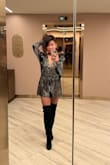 I wore this to a Katy Perry show. It was super fitting! I received many compliments from other women, and you can see the gold shine/glimmer when the light shines on you. A little loose at the v-neck area but no other complaints! - Alice C.
