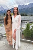 I got this dress for our wedding welcome dinner. It fit perfectly and was very comfortable! I wore flats, and it was a smidge long but not to the point that I was stepping on it or it was getting in the way. The material of the body is nice and double-lined so it wasn't see-through. The top/neckline had good coverage. The material does wrinkle, but comes out easily with a steamer. - Jenna S.