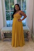 This dress was an absolute hit!!! I had to have the length altered because I'm 5 ft tall and wore chunky heels for a beach wedding so needed to get some length off but got so many compliments, the color was more mustard than I expected but still absolutely beautiful!!! - Surita S.
