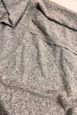 This is such a nice material. It's so soft and cozy but I would DEFINITELY recommend a size down! Downside: I only realized now that the seams are all inside out. See photos! - Tara E.