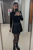 I really like the look and feel of this skirt, and it's a good length for me too. I feel like it slightly accentuates the little "plump bump" on my lower abdomen, but that's probably something only I notice. The skirt is still totally worth it. - Laura M.