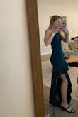 This dress is stunning! I love the ruffle/side slit details. So unique! - Madi K.