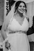 We planned a wedding in two weeks and I was able to order this dress and have it delivered in 2 days.
The dress fit really well and was flattering. Being 5' 4" and having no time for alternations I wore 4-inch heels and it worked. The dress itself is a little plain so I bought a bridal belt from Amazon and wore it with the dress. I do think if you are bigger in the chest the top can look a little "bulky". - Rachel M.