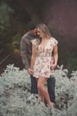I absolutely love this romper! It was the perfect look for our fall engagement pictures. It does fall off the shoulders a little bit but nothing to be overly concerned about! It had enough cleavage showing in a tasteful way. I would buy more outfits like this! - Julia S.
