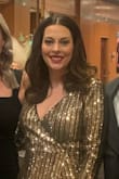 Ordered the dress in gold. Loved the color, loved the long sleeves, and the slit. My only complaint is that as a pear shape, wrap dresses often gape at my bustline. This was a little small for my bust, but a few safety pins would do the trick. - Katie M.