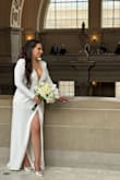 Used this dress for my civil wedding at the iconic San Francisco City Hall. Let me tell you this dress is stunning!!! Read the reviews and saw that most women said this dress runs large. So I ordered a medium instead of a large. (Maybe I should have ordered the large? You guys judge in the photos) I consider myself a triangle body I have wide shoulders and a smaller bottom. I had to use lots of fabric tape and nipple covers to secure the girls. The gown is very good quality and has heavy fabric. - Irene V.
