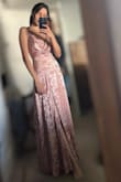 Pretty dress, The material wrinkles easily and the chest folds are disorganized but it looks good, classic, and elegant. - Paula A.