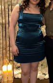 I loved the dress it was super cute. It is a little tight around my hips but I was still able to wear it. It also does wrinkle easily but I still loved the dress. - Basma K.