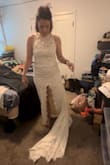 This dress is BEAUTIFUL. The pics don't do it justice as it was a video and I was screenshotting them. I am small in the chest but large [in the] bottom half, and I don't feel like it brought too much notice to that. With some spanx on, I think it will be perfect. I did have to take in the neck as it was too loose, but it took the person 10 mins to do. - Kelly J.