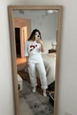 I have these overalls in 3 colors now! They definitely run big but they are AMAZING! In my case, the white pair is the largest fit of all 3 colors but overall definitely recommend it! - MacKenzie T.