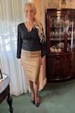 The skirt is amazing because it gives you a sleek leather look while being so comfortable at the same time! It runs true to size and comes in various colors! Here I am wearing the tan, but I also have the red and the black skirt! - Patricia W.