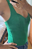 This top fits great and hugs my body. I'm afraid of washing it and possibly shrinking it so I probably won't throw it in the dryer. It looks exactly like the photo and I'm excited to wear it out! - Chriselle T.
