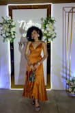 The material looks very nice and the fit is beautiful. - Kathia C.