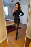 This dress is softer and stretchier than I thought, which makes it even comfier to wear! I love the hints of gold running through the material. The back is low, but not so low that it reveals the top of the tights I wore underneath. I wore this to a concert and received nice compliments! Definitely a keeper. - Joy I.