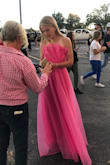 This dress was SO PRETTY!!! I made some great memories in it and I wore it to my Senior homecoming parade, I am so in love. The top was very tight but once I got it zipped it was perfect and it did not slide around a bit! I had to get the dress steamed because it got extremely wrinkly in the shipping process, but after that, it was so beautiful! - Gentry T.