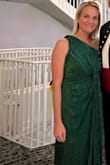 This was a bad purchase on my part. This would be a great maternity or postpartum dress but not for the average figure. The front tie with the extra fabric sticks out and makes you look way larger than you are. I had no backup so I had to wear this and I felt uncomfortable the entire night and so embarrassed. We left early. I would not recommend it. - Elle W.