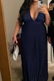 This dress was beautiful! It fits long even with 3.5" heels. You'll need boob tape if you have large breasts as it is difficult to wear a bra with it. Nice and flowy and very comfortable. The fabric has a beautiful shimmer without worrying about leaving a trail of glitter. - Karen C.