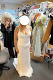 I love this dress. It is more than I expected. I am really short so it has to be shortened an inch but it's not bad for buying it online and not trying it on beforehand. It's more affordable than any bridal shop I've been to and the quality is amazing. I highly recommend it. - Rachelle B.