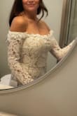 This is a lovely dress; I wish I could have kept it. It was a little snug (runs a little small) but the bigger problem is I could not raise my arms if I were to hug my fiance. That would be a problem during the ceremony and reception. I would recommend ordering a size larger and having a seamstress alter it. - Heather G.