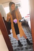 This coat is amazing! I ordered it for a work conference up north (quite warm where I am currently) and it tied all my outfits together! After reading the comments, I ordered one size down (I am usually a medium so I ordered a small). When I received the first order, it was still way too big, so I ordered an extra small to replace it. The extra small was perfect and still had a bit of room! Highly recommend this jacket and encourage you to buy two sizes down from your normal! - Courtney W.
