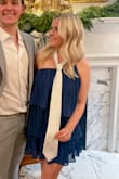 A perfect dress for girls wanting something more flowy for semi-formal! The elastic band that goes around your chest was a little loose so I had trouble keeping it up a bit even with a typical chest size! The underskirt feels like it might be too short but the flowy part covers everything. - Megan L.