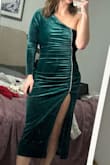 I love this dress!! For reference, I am in between a size 8 and 10; I am 5'7 & 160 pounds. I could have gotten a medium, but it would've been too tight in my arms and would have been too short. It is great quality and super comfortable - Catherine K.