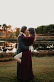 I bought this dress for our engagement photos, and it was perfect! It is long, so I had it hemmed and the bust taken it slightly (it's a little low cut). The leg slit made for some very beautiful photos, and the burgundy color is gorgeous! The only con is that it does show sweat (especially in the armpit area), and I had to buy a special, backless bra to wear with it. - Alexa K.