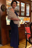 This dress is amazing. The fabric is thick, and soft, and gives the feel and appearance of a luxury material. I got compliments from friends and strangers all night. I really amped up the opera night vibes with some faux pearls and faux fur. So elegant! Highly recommend. - Alexis A.